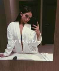 Konya'nın Baş Döndüren Kızıl Saçlı, Fit ve Şehirli Stiliyle Karşınızda: Meram Escort Bayan